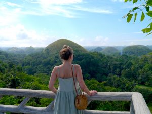 Standing in front of the Chocolate Hills